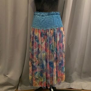 Gorgeous floral skirt has elastic waist. 30” but stretched out further.31” skirt